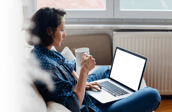Woman sitting on a lounge chair